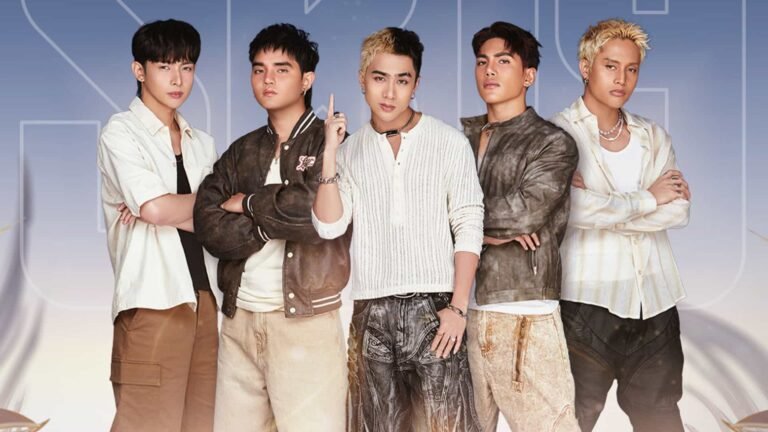 Image of SB19 posing in front of a light blue and white background